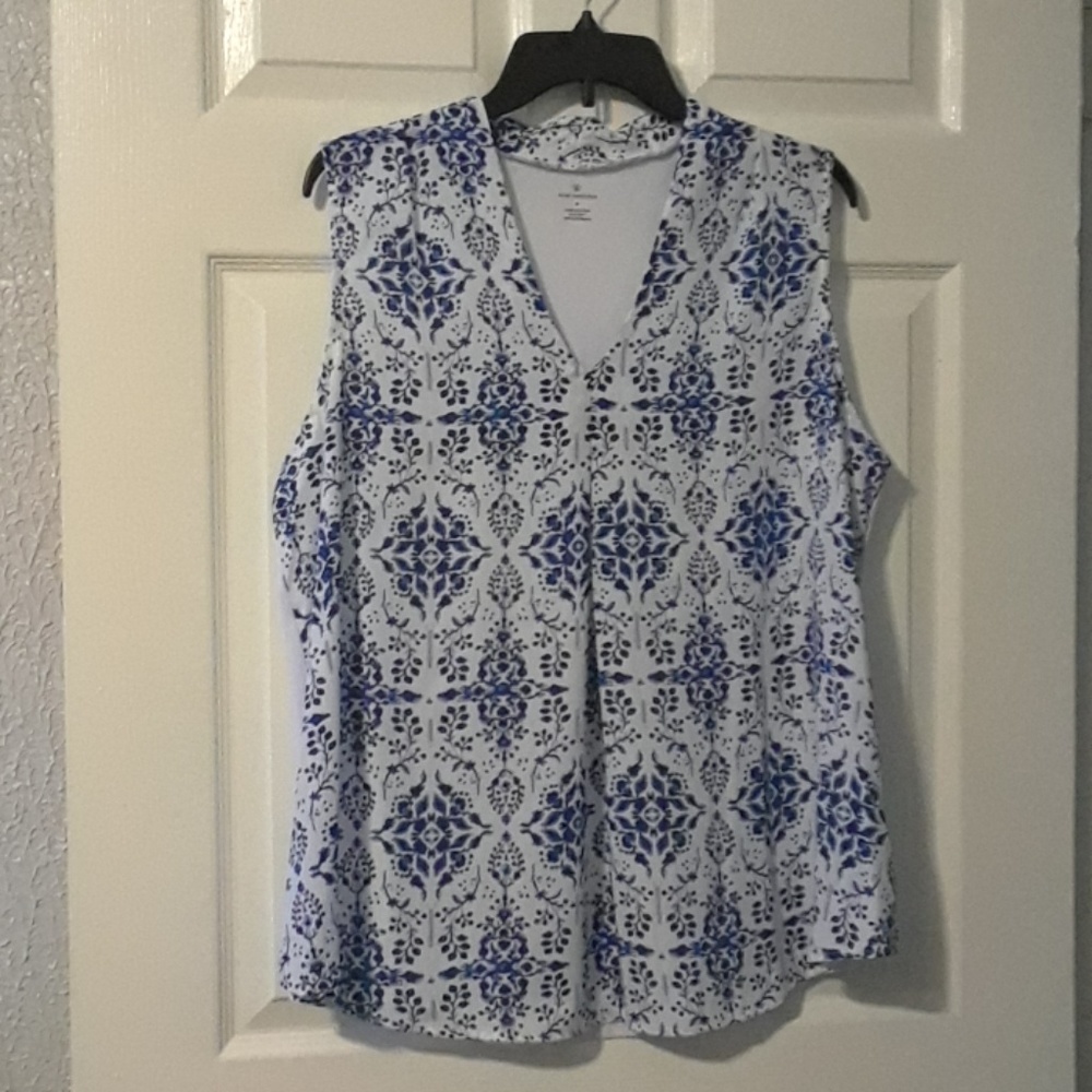 Lovely and flowing blue and white print blouse.